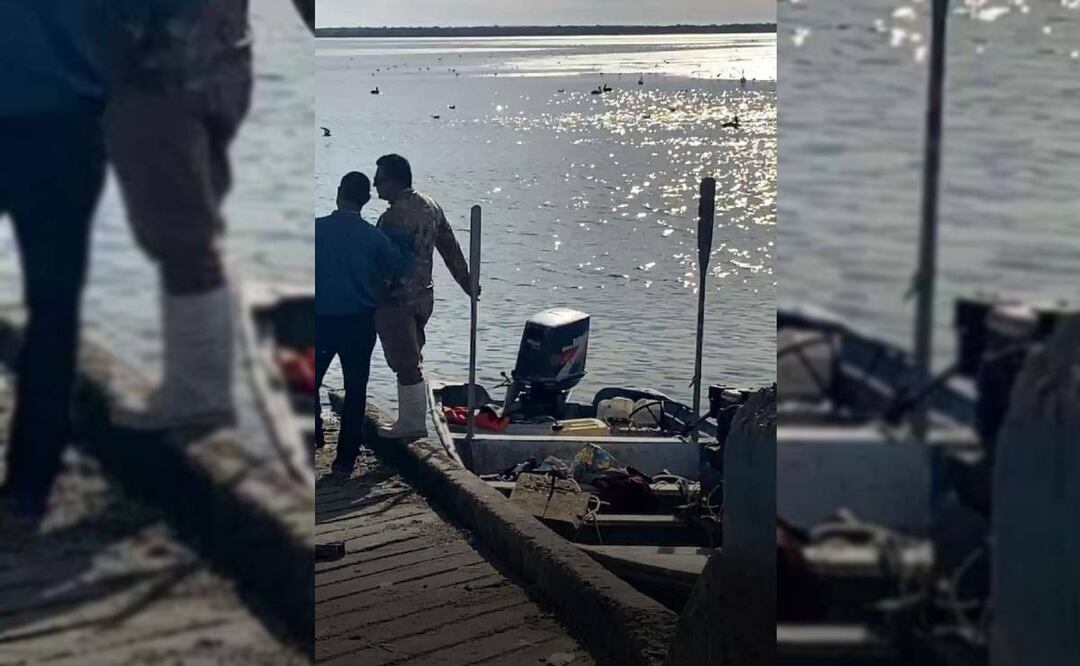 El cuerpo del hombre de mar fue llevado por sus compañeros pescadores al muelle de Yavaros.. Foto: Especial