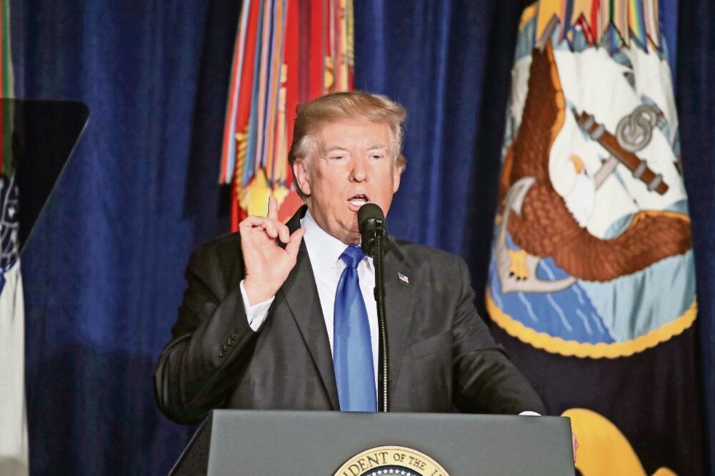 El presidente de Estados Unidos, Donald Trump, ayer al pronunciar su discurso sobre la estrategia que seguirá el país en Afganistán (MARK WILSON. AFP)