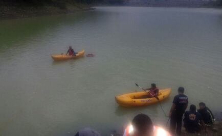 Buzos buscan a niño que cayó en presa en Atizapán