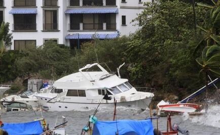 Carlos weakens off Mexico, but heavy rains and strengthening seen