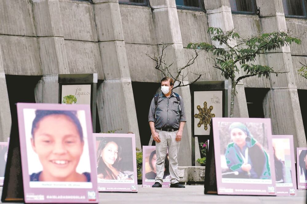 Retrato s de víctimas de feminicidio en Medellín, Colombia. Foto: JOAQUÍN SARMIENTO. AFP