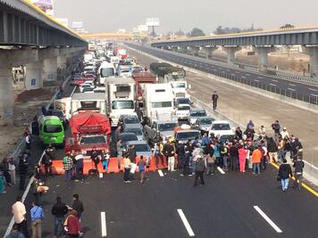 Reabren la México-Puebla tras firmar acuerdo