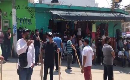 Con machetes y palos, piden comerciantes abrir negocios en Chiapas 