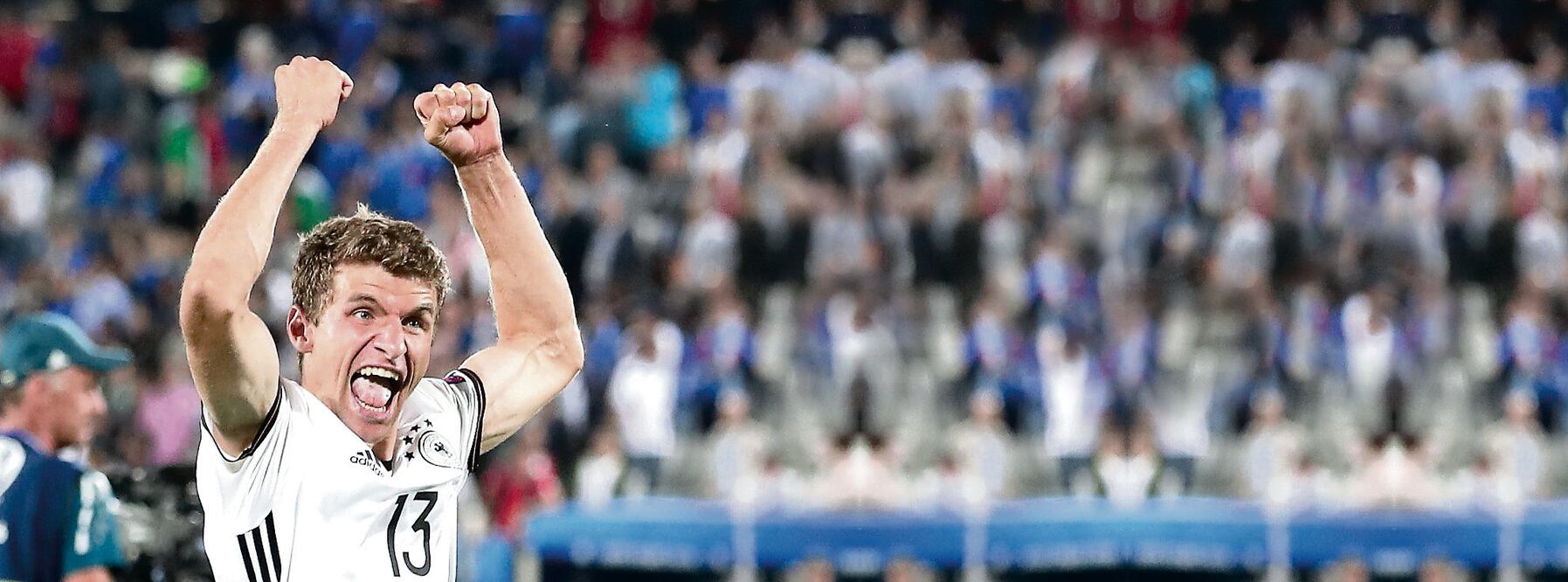 Thomas Müller festejó la victoria con un sonoro grito, pese a que su disparo en la ronda de penaltis fue atajado por Buffon (GUO YONG. XINHUA)