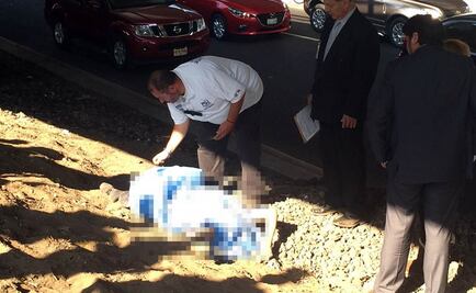 Hallan cadáver en camellón de Periférico y San Jerónimo