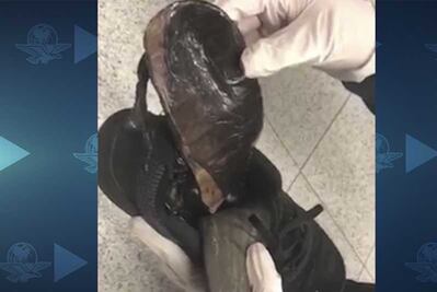 Mujer es detenida por transportar droga en el AICM