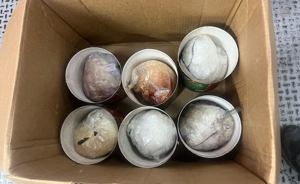 Latas de salsa para pizza con droga sintética. Foto: Guardia Nacional