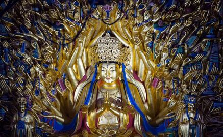 Concluye restauración de famoso buda de las mil manos