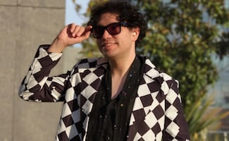 Raymix denuncia robo en su camerino durante concierto; su staff resulta afectado