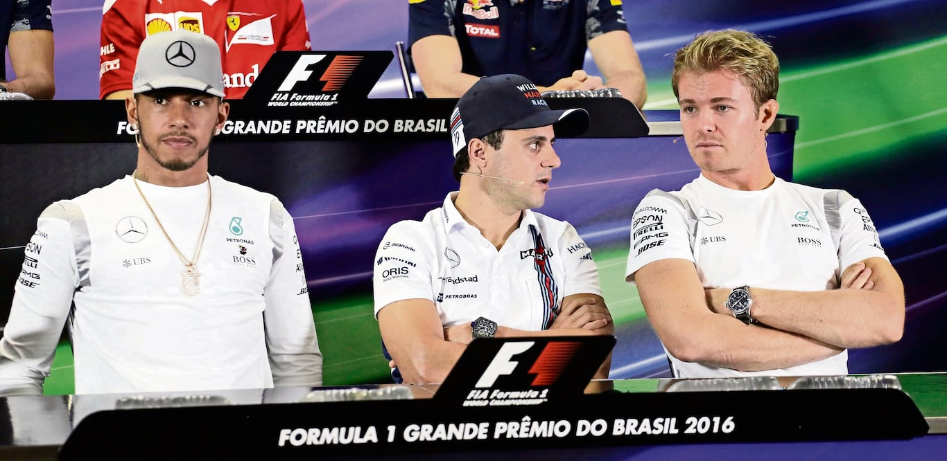 Lewis Hamilton, Felipe Massa y Nico Rosberg se alistan para el inicio de la batalla en Brasil (NELSON ANTOINE. AP)