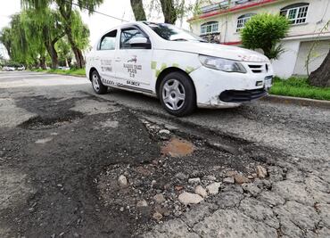 Baches provocan daños de $8 mil en autos