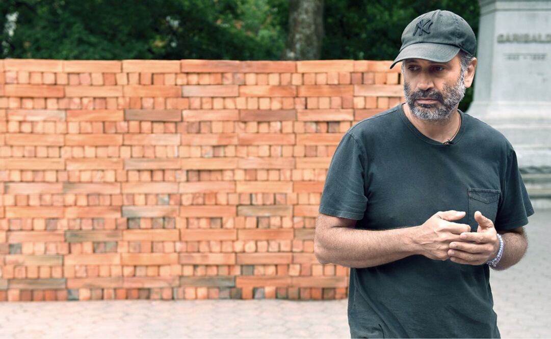 Once installed, audiences circulating through the riverbank will be invited to dismantle the wall brick by brick - Photo: Timothy A. Clary/AFP