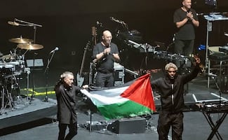Massive Attack responde al veto de Singapur tras ondear una bandera palestina: "Estamos orgullosos"