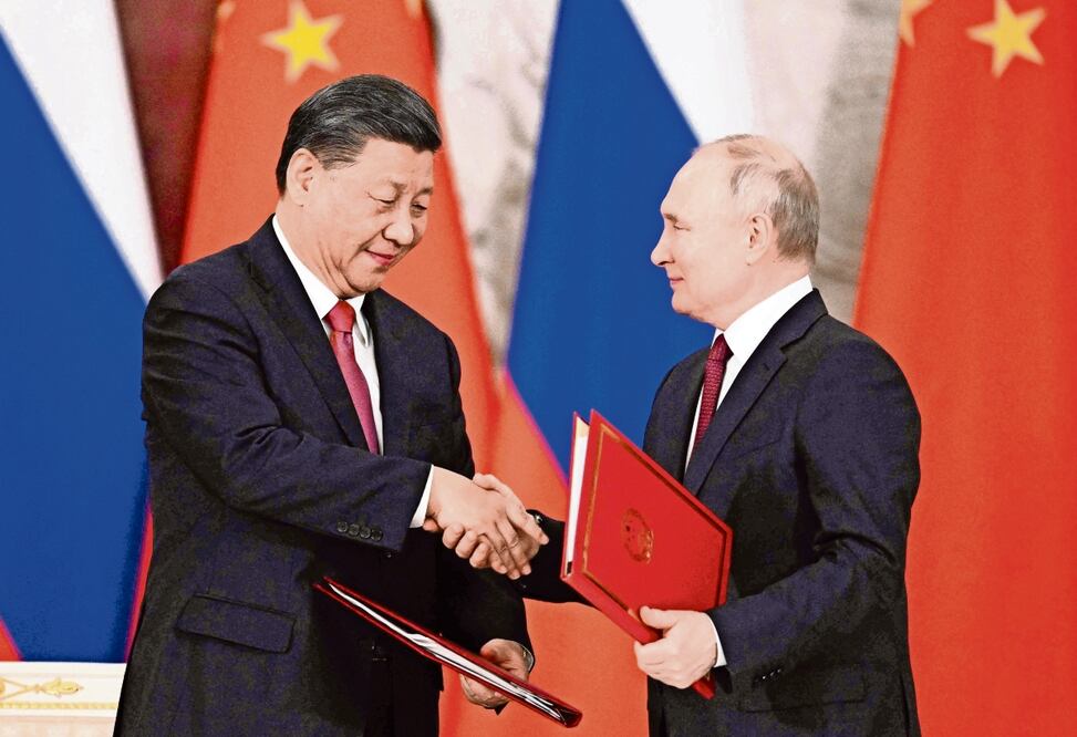 El presidente de China, Xi Jinping, con el mandatario de Rusia, Vladimir Putin, el pasado 21 de marzo en el Kremlin. Foto: Vladimir Astapkovich / AFP