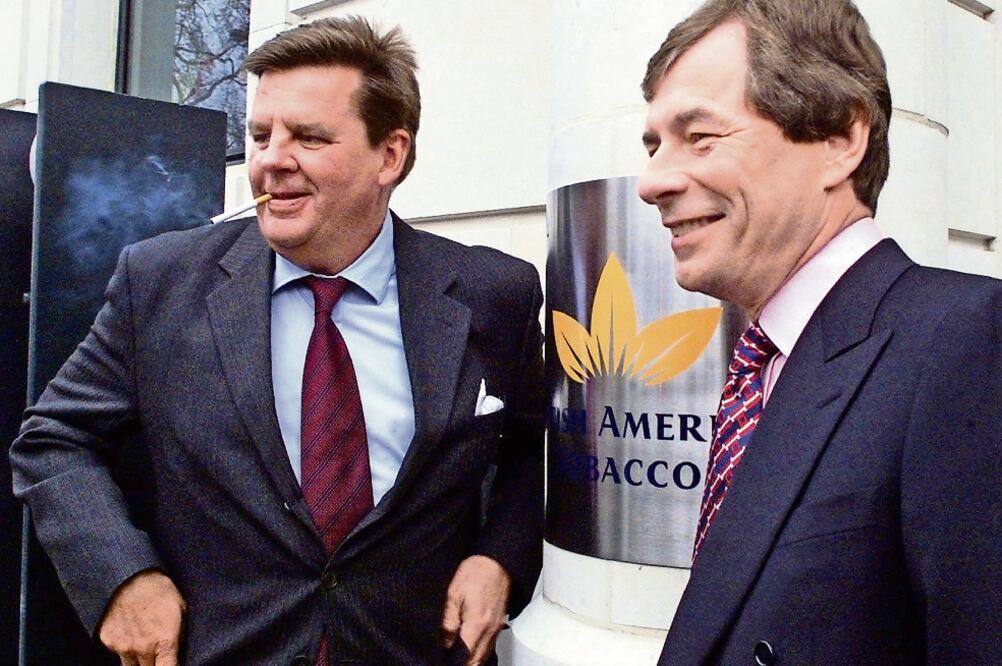 CEO, Johann Rupert (el hombre con el cigarro)