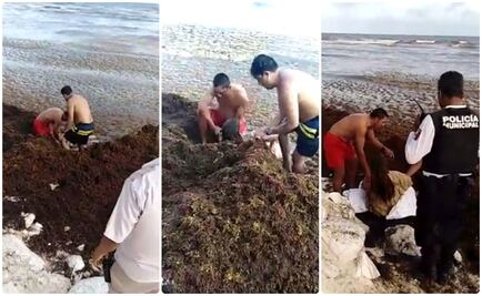 Rescatan a turista a punto de ahogarse entre sargazo en Playa del Carmen