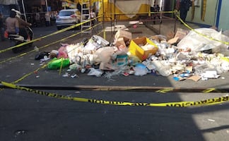 Hallan cuerpo abandonado entre puestos del tianguis de Tepito; detienen a un presunto implicado