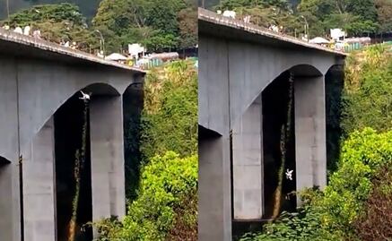 Captan en video cómo mujer se avienta con su hijo de puente en Colombia