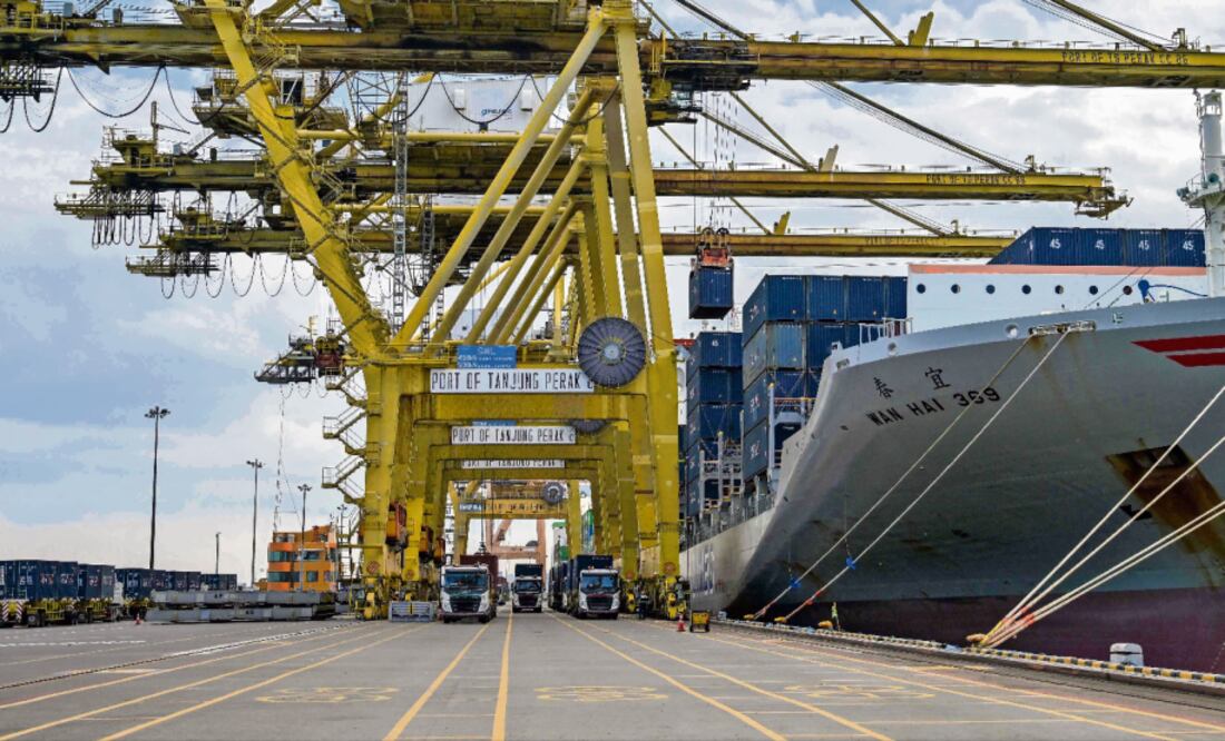 El arancel de 25% aplica sólo a exportaciones que incumplen las reglas de origen del T-MEC. Foto: AFP/Archivo