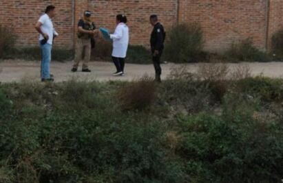 Hallan en dren el cuerpo de una mujer en Guasave