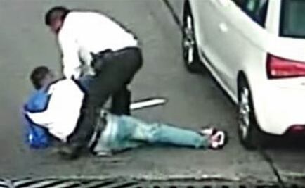 Ascienden a policía que disparó contra un asaltante