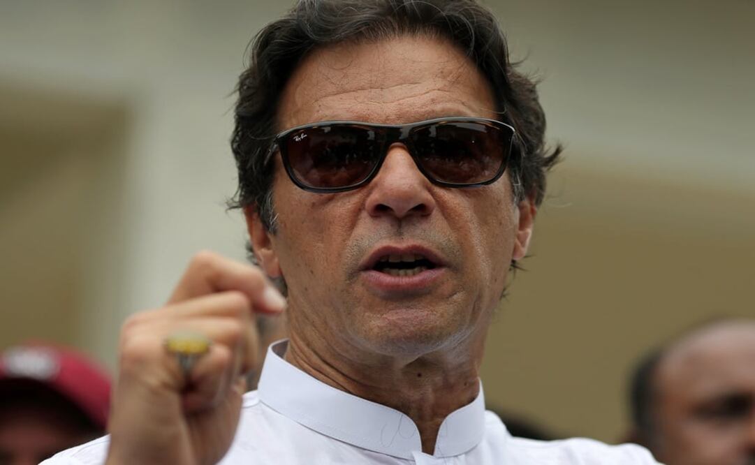 Cricket star-turned-politician Imran Khan, chairman of Pakistan Tehreek-e-Insaf (PTI), speaks to members of media after casting his vote at a polling station during the general election in Islamabad, Pakistan - Photo: Athit Perawongmetha/REUTERS