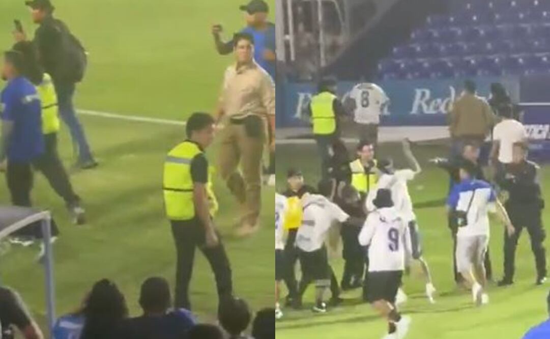 Policía apunta con un arma a aficionados en el partido de Celaya contra Tampico - Foto: Especial