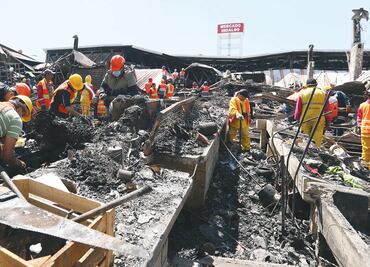Tras incendio, reabren dos naves del Mercado Hidalgo