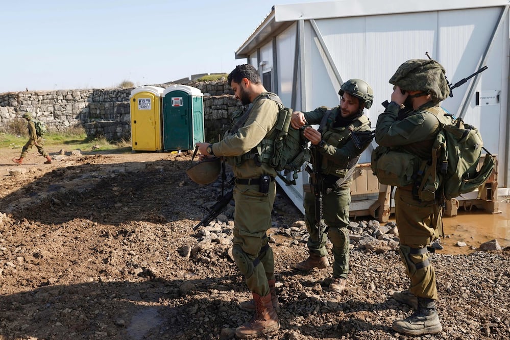 Soldados israelíes cerca de la frontera con Siria, el 28 de diciembre de 2023. En la escalada reciente, las autoridades israelíes aseguran que atacan Siria para proteger a los drusos. Foto: AFP