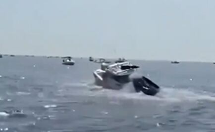 Captan en video salto y caída de una ballena jorobada en un bote en EU 