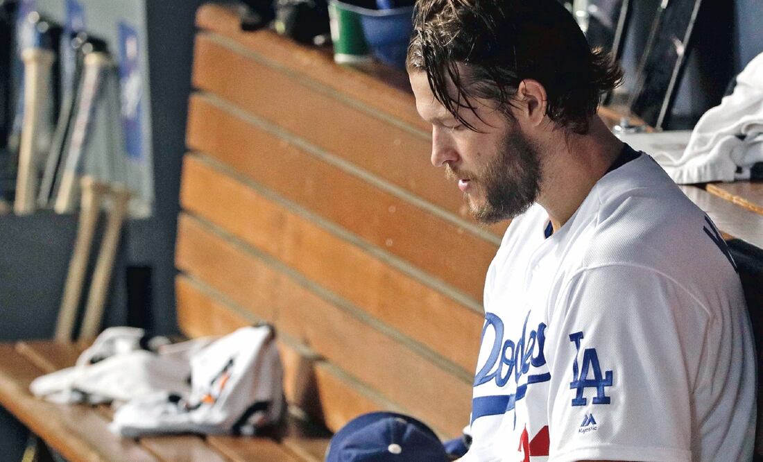 EL picher de los californianos se desmoronó ante la ofensiva bostoniana. JAE C. HONG. AP