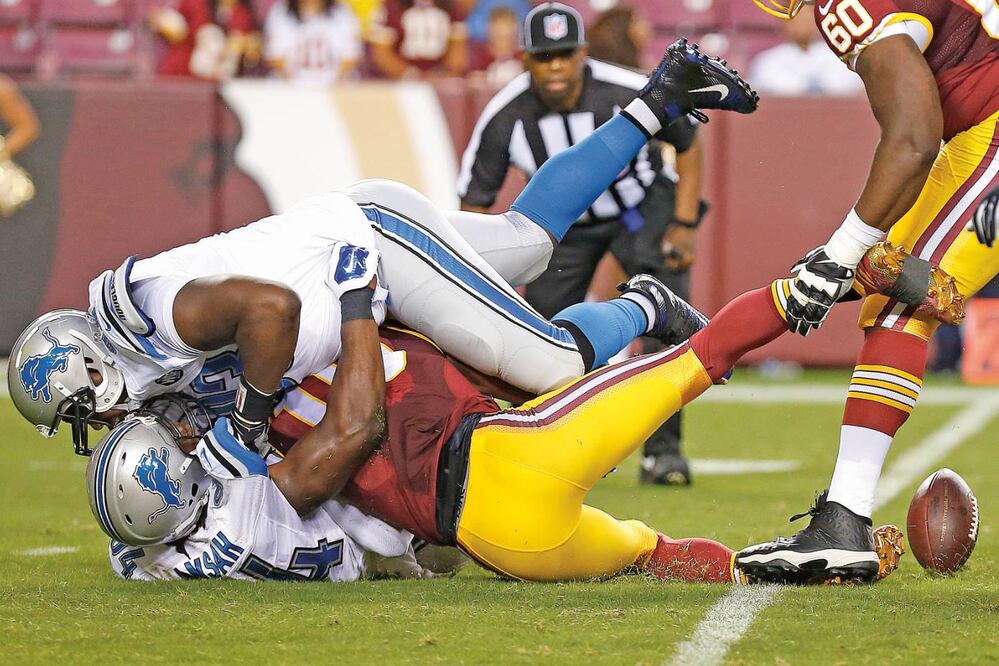 En su última jugada, Griffin corrió, perdió el balón y al querer recuperarla Corey Wootton cayó encima de su cabeza (GEOFF BURKE. USA TODAY SPORTS)