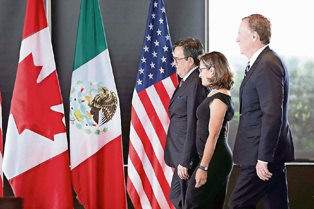 Representantes comerciales de México, Canadá y Estados Unidos, durante la tercera ronda de negociaciones en Ottawa (ARCHIVO EL UNIVERSAL)