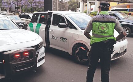 En AICM, Guardia Nacional sólo amonesta a los taxis de Uber