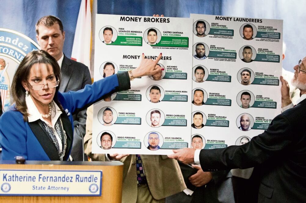 Las autoridades de Florida presentaron fotografías de 22 integrantes de la red de lavado de dinero, de los cuales sólo tres han sido arrestados, dos de ellos en Miami. WILFREDO LEE. AP