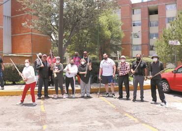 Vecinos se arman con palos para defender voto