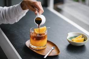 Para qué sirve tomar jugo de naranja con café