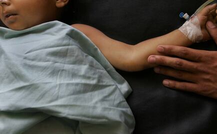 Hallan con vida a niña junto a cadáveres en Uruguay