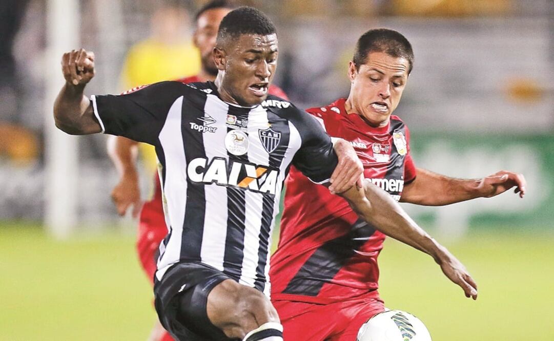 El delantero mexicano batalló para poder marcar nuevamente con las Aspirinas. (JOHN RAOUX. AP)