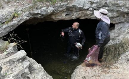 Extraen 109 kilos de basura de cenote usado como tiradero clandestino en Yucatán; piden cuidar ecosistema