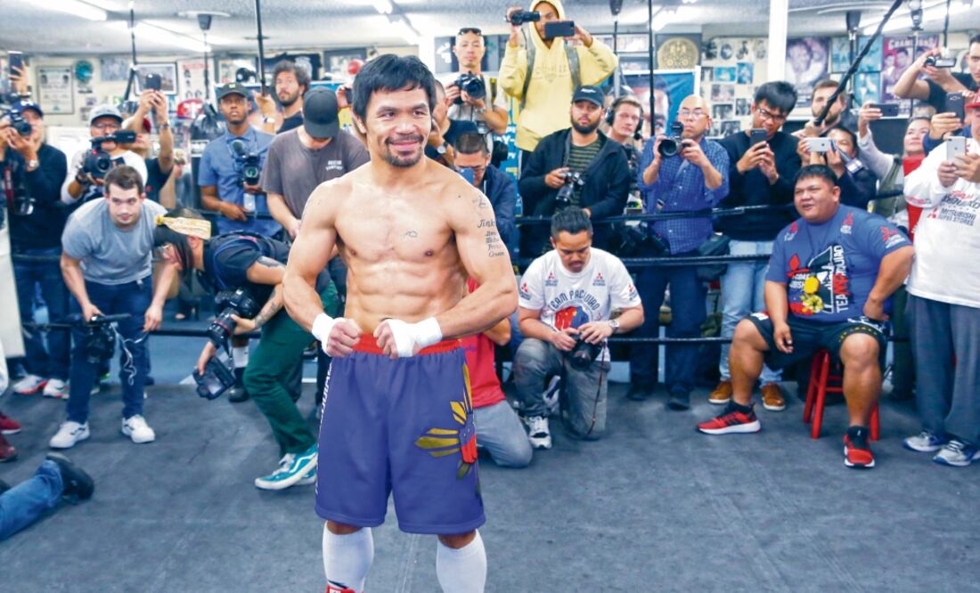 Pacman tiene confianza en vencer a su rival, 11 años menor. (DAMIAN DOVARGANES. AP)