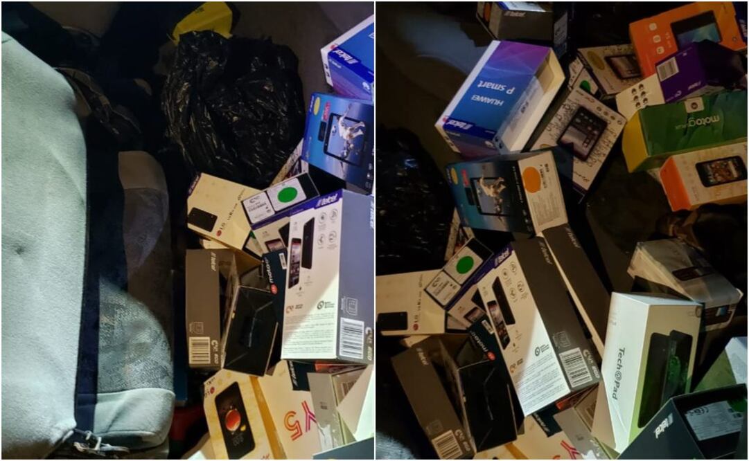 Policías revisaron al vehículo que manejaban los señalados y encontraron los teléfonos celulares de diferentes marcas. FOTOS: ESPECIALES