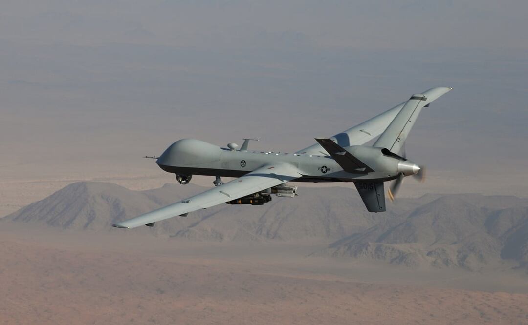 El dron MQ-9 Reaper, armado con municiones guiadas por láser GBU-12 Paveway II y misiles AGM-114 Hellfire, durante una misión de combate. Foto: EFE