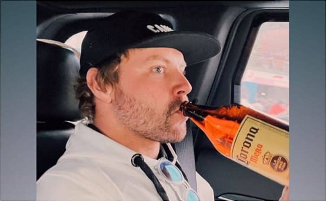 El piloto finlandés bebiendo una cerveza al final del Gran Premio / Foto: Especiales