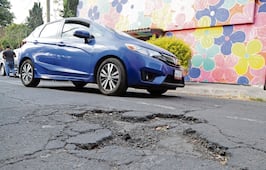 Cómo pedir indemnización al gobierno si caíste en un bache estas lluvias
