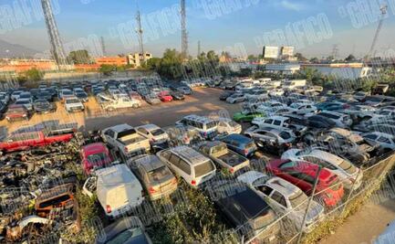 Hallan cadáver en cajuela de auto robado que estaba en corralón de Ecatepec