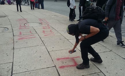 Encapuchados causan destrozos en marcha por los 43