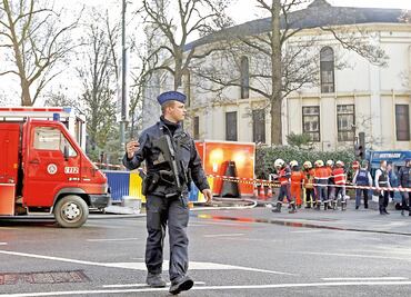 Bélgica rebaja nivel de alerta; siguen cateos