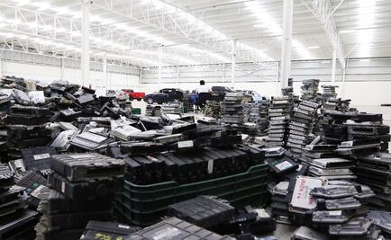 Comienzan devolución de miles de computadoras de vehículos robadas