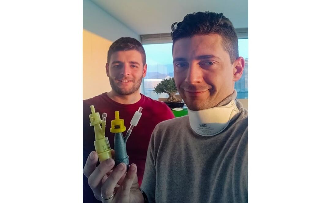 Los ingenieros Alessandro Romaioli y Christian Fracassi son los ingenieros que imprimieron las válvulas Venturi para un hospital en Brescia. Foto: Handout / ISINNOVA / AFP